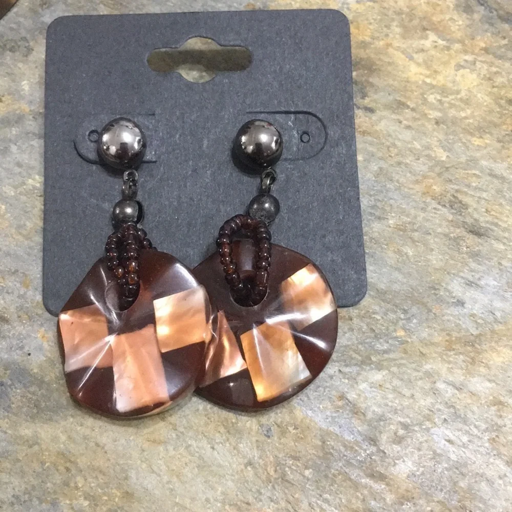 Necklace and earrings. New